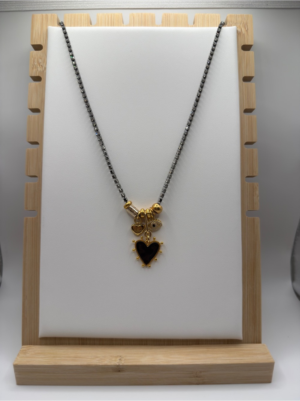 Elizabeth Cole Gold & Black Heart & Charm Pendant Necklace on Rhinestone